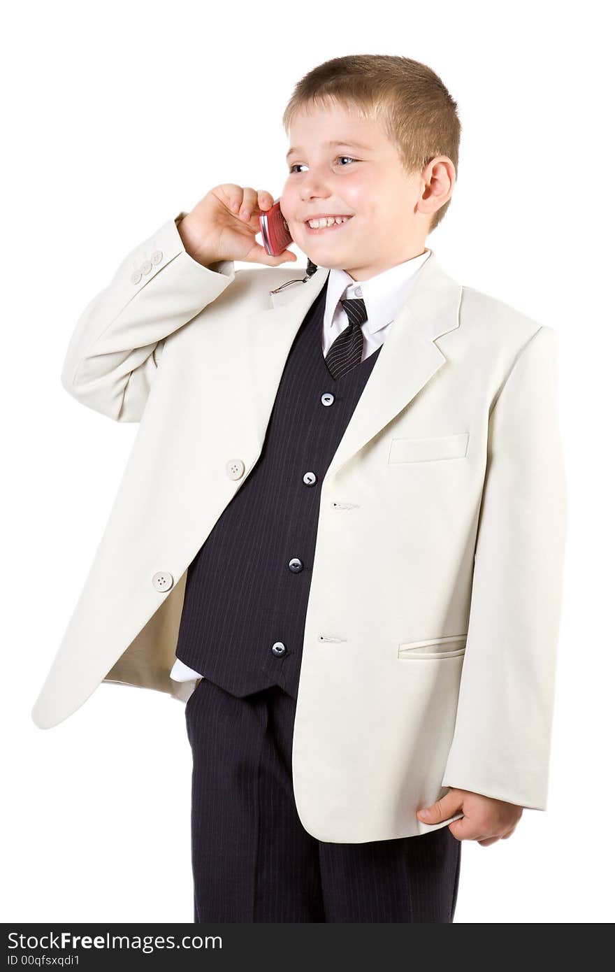 Well-dressed boy like businessman calling at mobile phone isolated on white. Well-dressed boy like businessman calling at mobile phone isolated on white