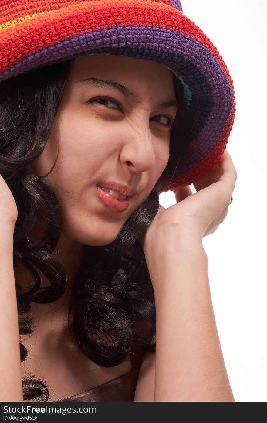 Funny girl wearing a hat on a white background