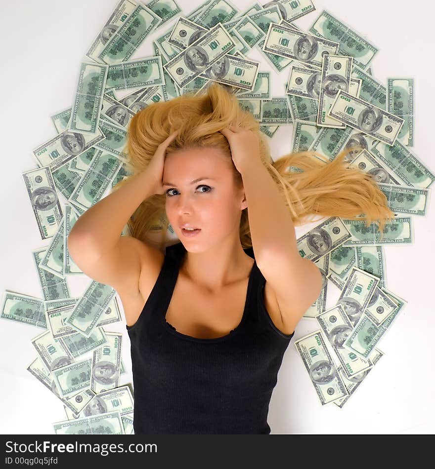 Happy girl holding cash over white background. Happy girl holding cash over white background