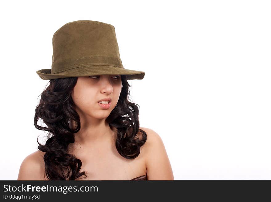 Attractive female wearing a green hat - sneering. Attractive female wearing a green hat - sneering