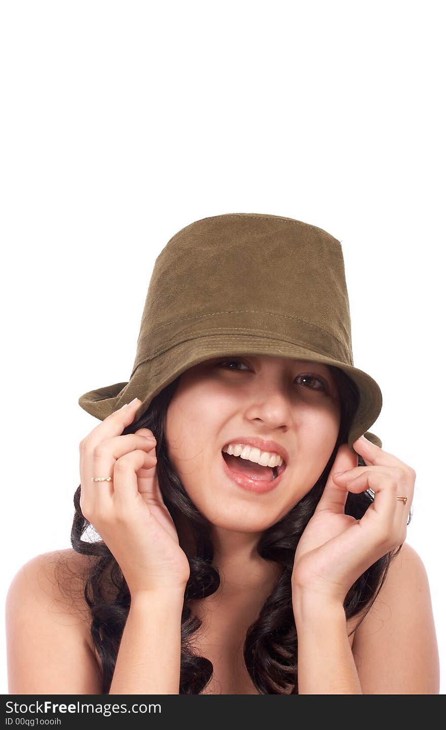 Happy young lady wearing a green hat