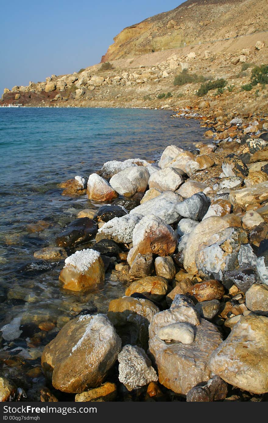 Rocks on Dead Sea coast, Dead Sea is the lowest place in the world, And where it is called the Jordan Valley, Filled with salt water, Many mineral elements which exist in abundance, dissolved in its water, Also called the Sea of Lot. Rocks on Dead Sea coast, Dead Sea is the lowest place in the world, And where it is called the Jordan Valley, Filled with salt water, Many mineral elements which exist in abundance, dissolved in its water, Also called the Sea of Lot