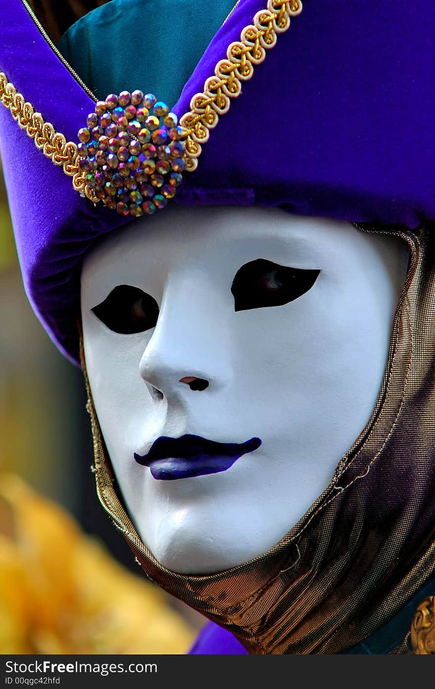 France. Paris: Celebration of the grape harvest of Montmartre. Beautiful and colorful venetian mask