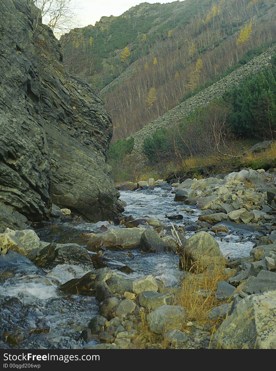 The miuntain ridge Baikal'sky (near the Baikal). Autumn. The miuntain ridge Baikal'sky (near the Baikal). Autumn.