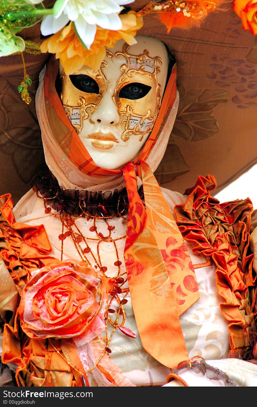 France. Paris: Celebration of the grape harvest of Montmartre. Beautiful and colorful venetian mask