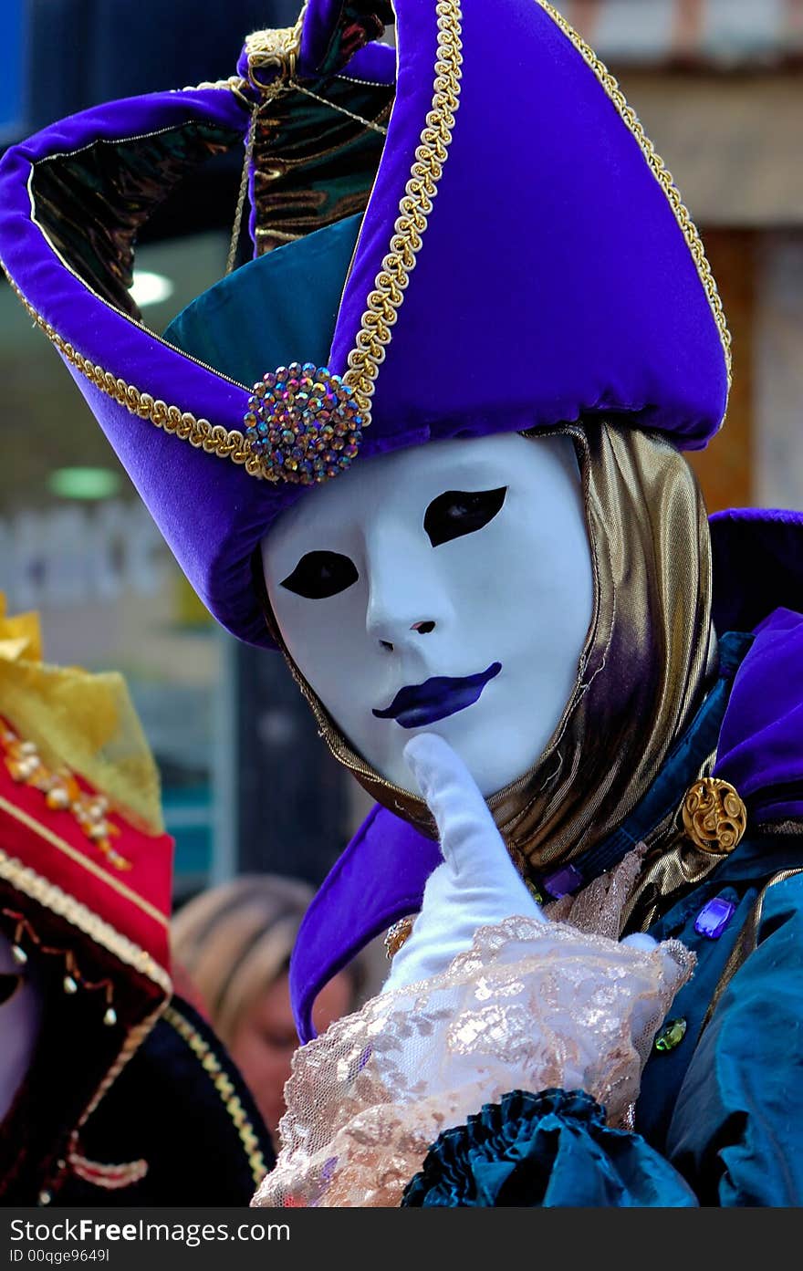 France. Paris: Celebration of the grape harvest of Montmartre. Beautiful and colorful venetian mask