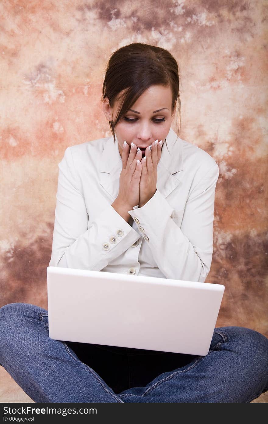 Happy girl with white laptop computer. Happy girl with white laptop computer