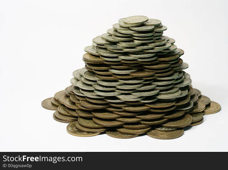 Close-up of pile of coins on the white background (isolated on white)