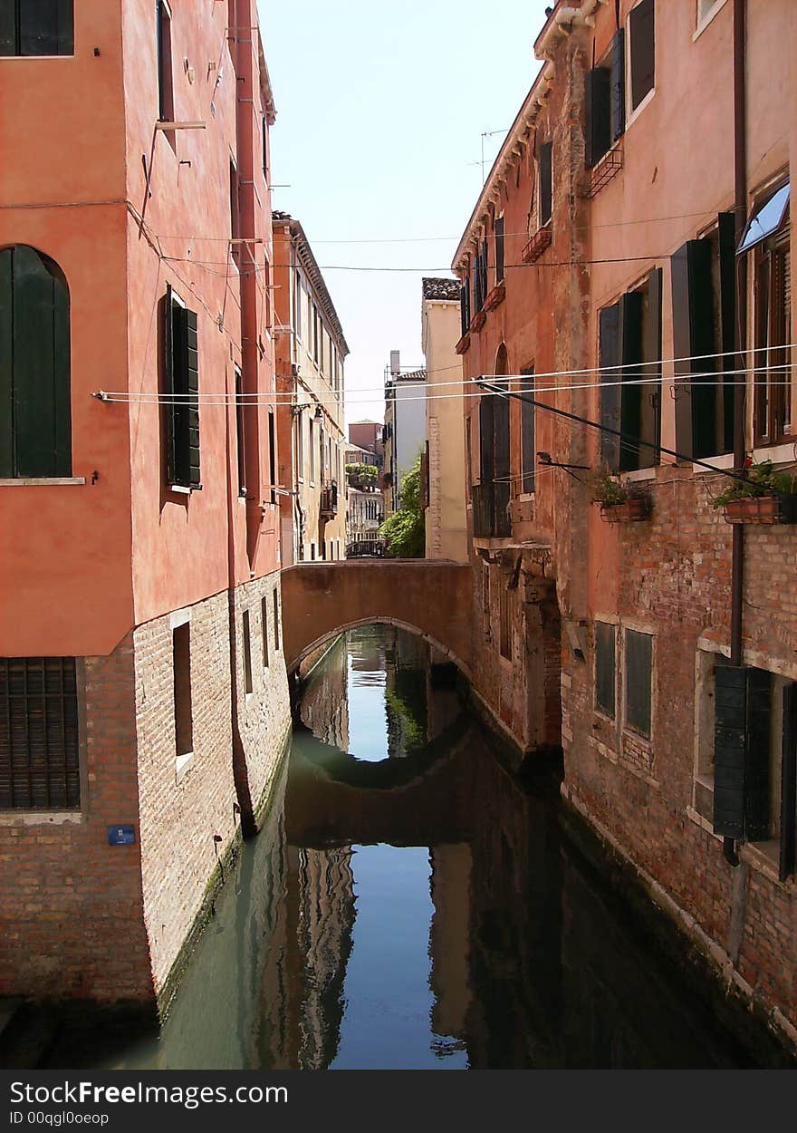 A pretty and colourful canal in Venice