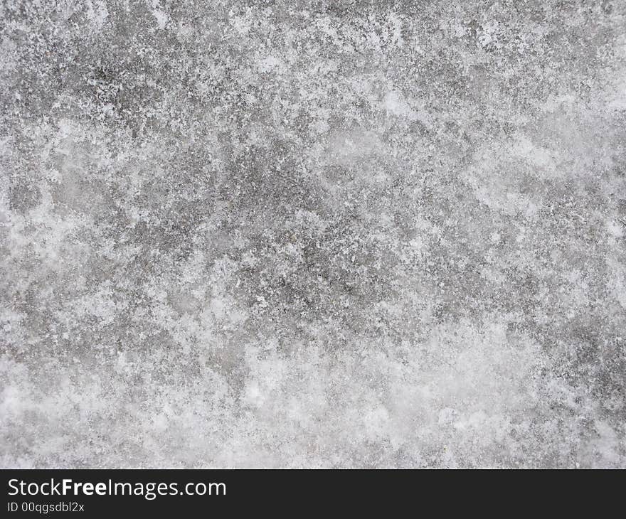 Ice-covered pavement surface