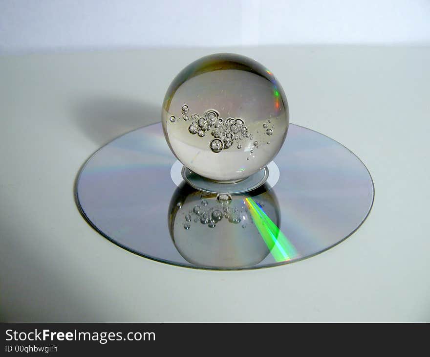 Glass sphere on a disk