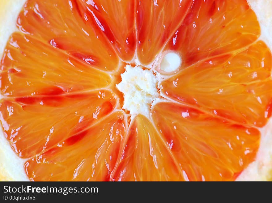 Close up image of  slice of red orange