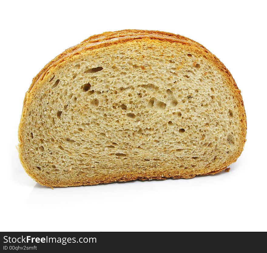 Cut of fresh baked bread isolated over white background