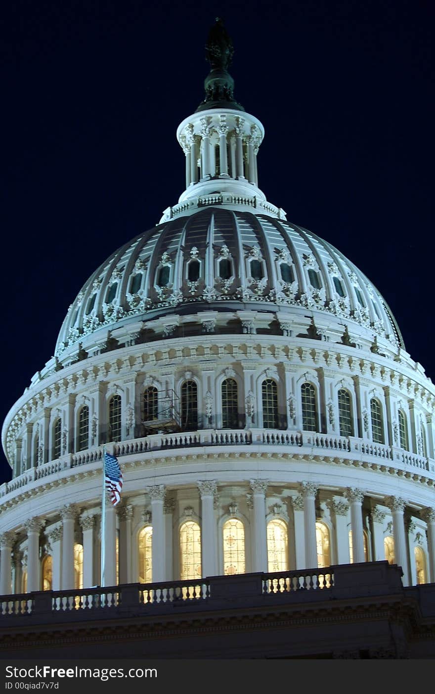 Photo of details of the dome of the US capitol at night. Photo of details of the dome of the US capitol at night