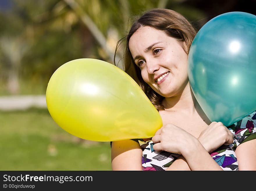 Beautiful woman with balloons in her hands. Beautiful woman with balloons in her hands