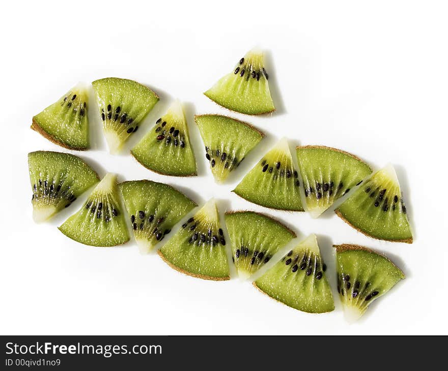 Triangular slices kiwi fruit as geometrical figure