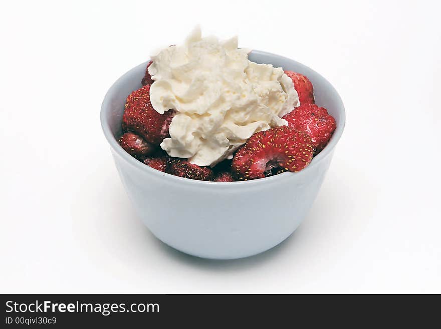 Delicious tasty strawberry under whipped cream. Delicious tasty strawberry under whipped cream