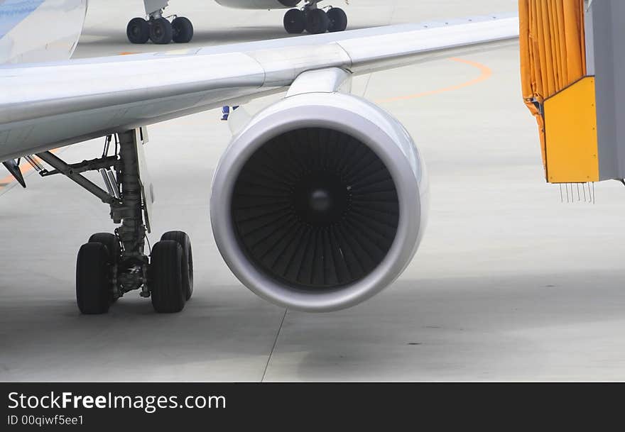 Aeroplane parked at the gate Preparing for take off. Aeroplane parked at the gate Preparing for take off