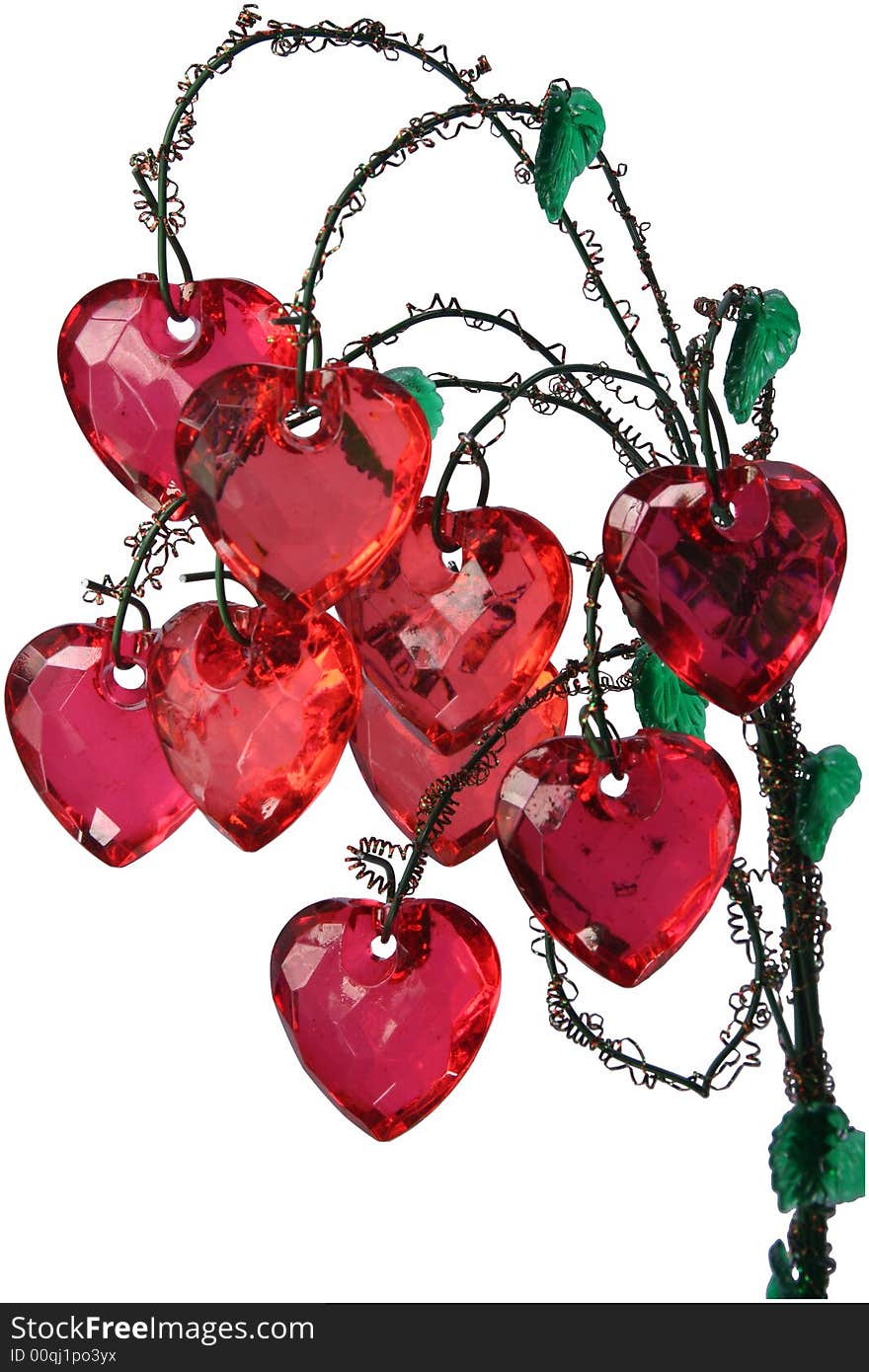 Bunch of nine red glass hearts with steel stalks and plastic leafs on white background. Bunch of nine red glass hearts with steel stalks and plastic leafs on white background