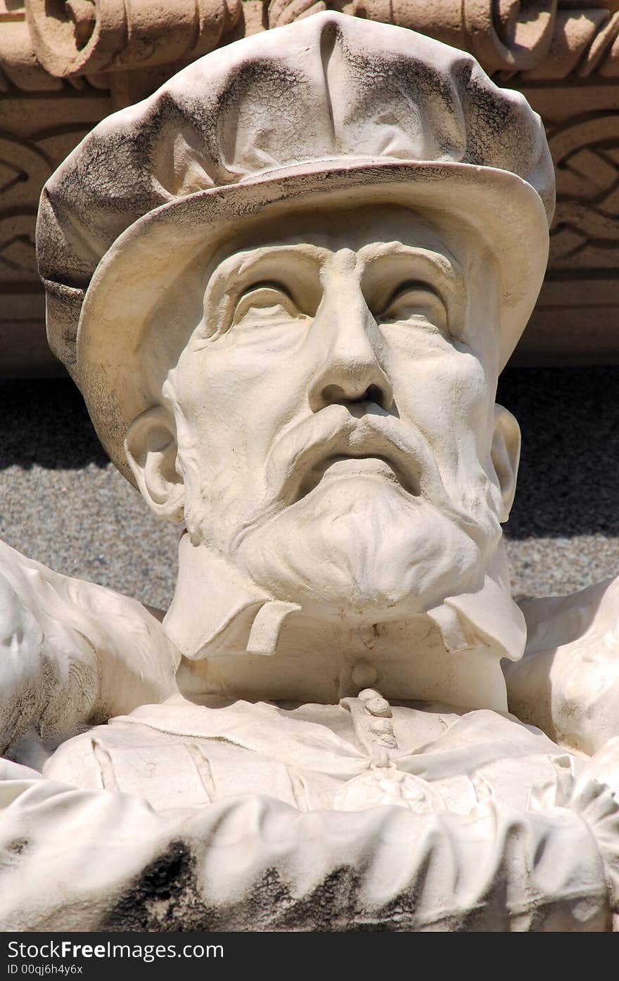 France, Paris, Rivoli street: statue of Gaspard de Coligny; white stone for this sculpted stone head with medieval hat. protestan important figure