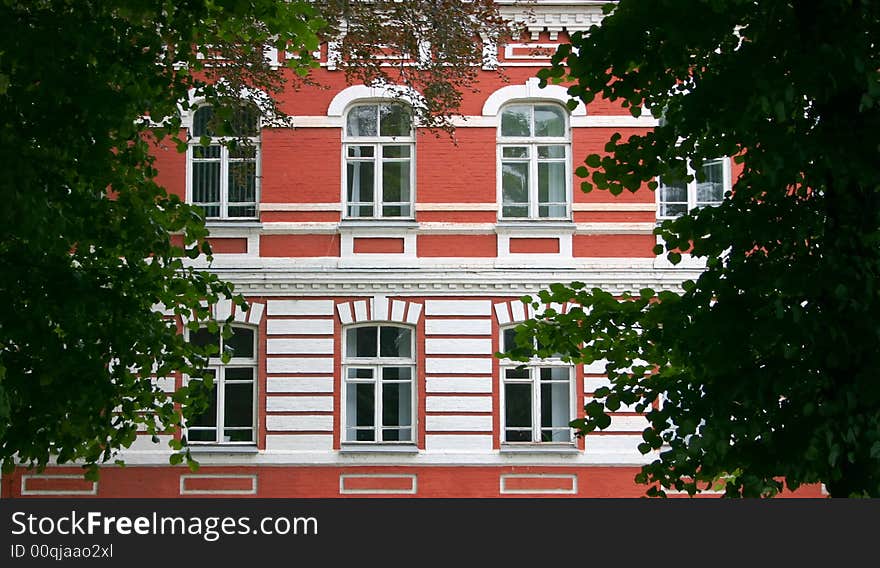 Windows in a wall of red color