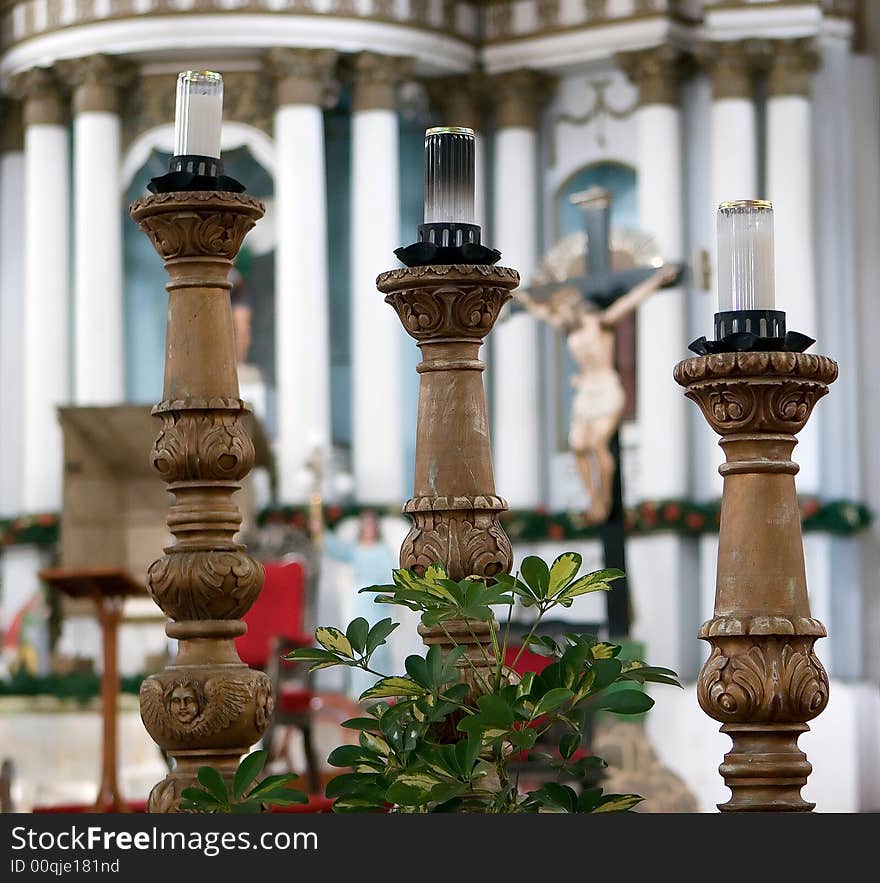 Three wooden candle holder