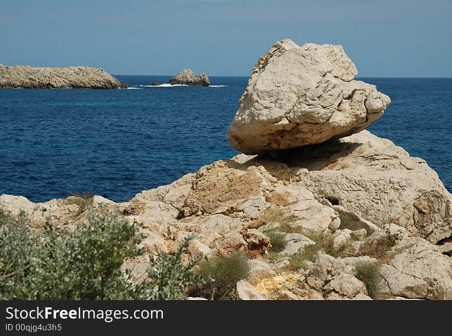 This is a bizzar rock formation of Mallorca, a  rocky  beach motive, was maked in the may last year. Is a fascination Detail of nature. Its ideal for backround and publicity. This is a bizzar rock formation of Mallorca, a  rocky  beach motive, was maked in the may last year. Is a fascination Detail of nature. Its ideal for backround and publicity.