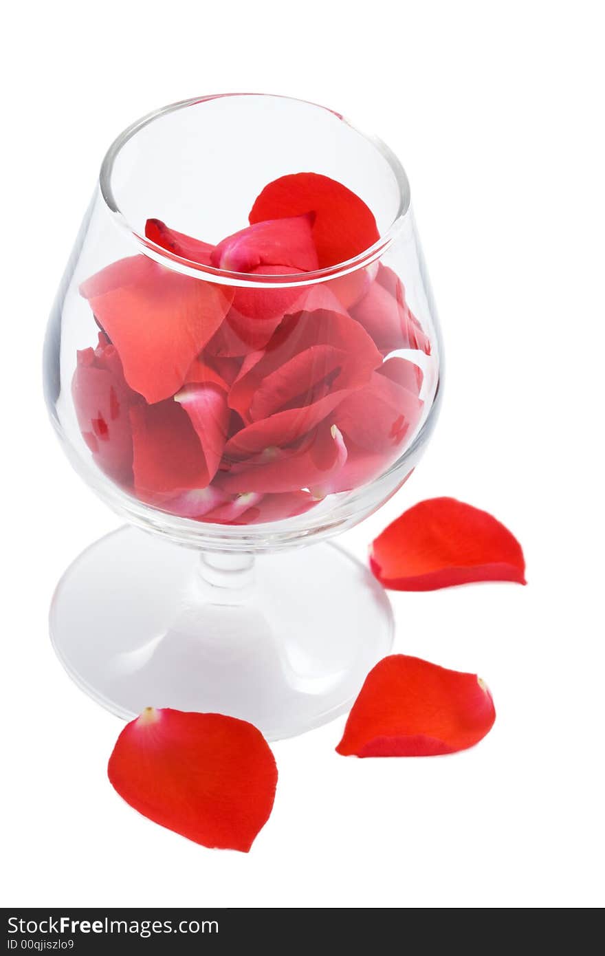 Rose petals in glass isolated