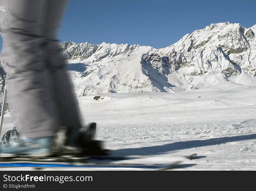 Skier on a background of mountains