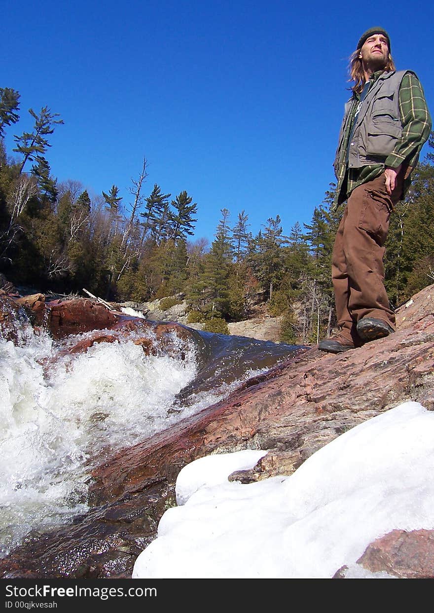 Melting snow creates a raging waterfall in Canada. Melting snow creates a raging waterfall in Canada.