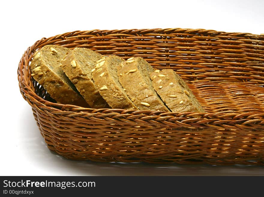 Wicker basket with slice of bread. Wicker basket with slice of bread