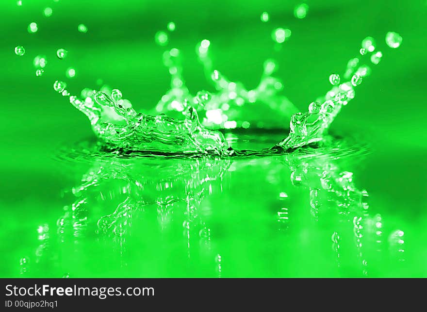 Fresh green water splash. Background.