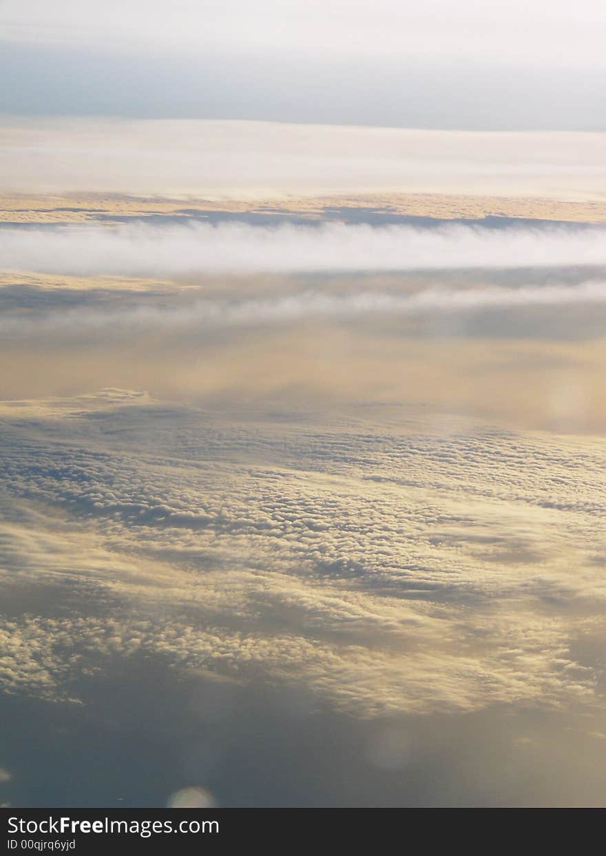 Clouds section from flying aircraft. above the clouds.