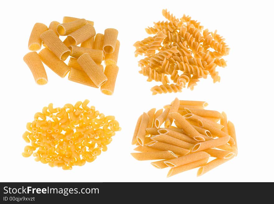 Healthy ziti,rigatoni, fusilli, and ebows pasta on a white background. Healthy ziti,rigatoni, fusilli, and ebows pasta on a white background