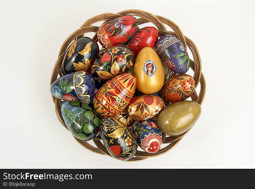 Basket with colour easter eggs. Basket with colour easter eggs.