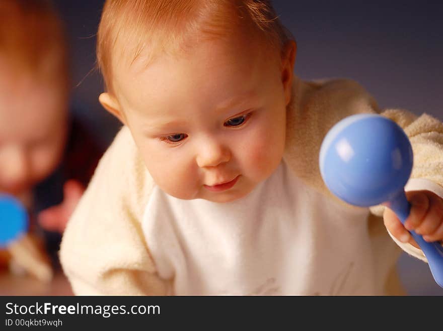 Baby With A Toy