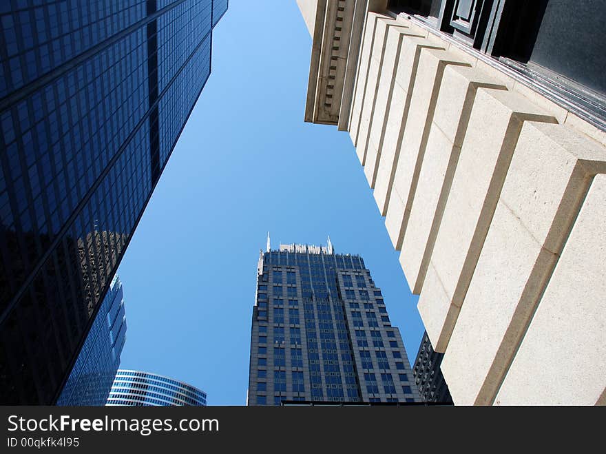 Chicago downtown, View at the sky between modern office buildings. Chicago downtown, View at the sky between modern office buildings.