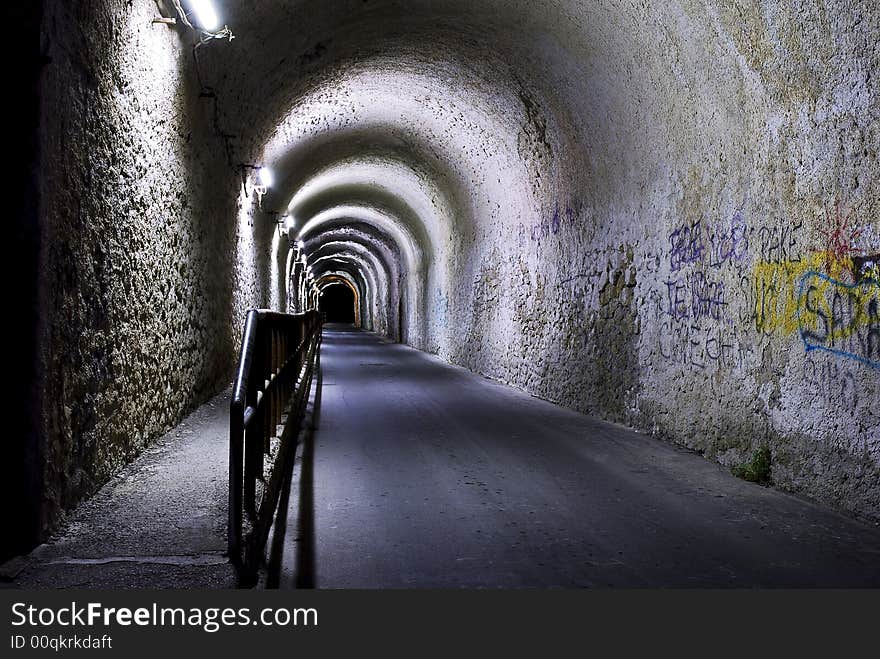 A short pedestrian tunnel under the hill. A short pedestrian tunnel under the hill