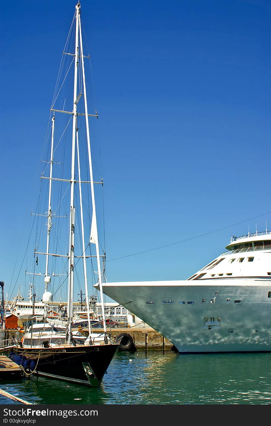 Ocean yacht near luxury passenger cruise liner at the port of cape town south africa