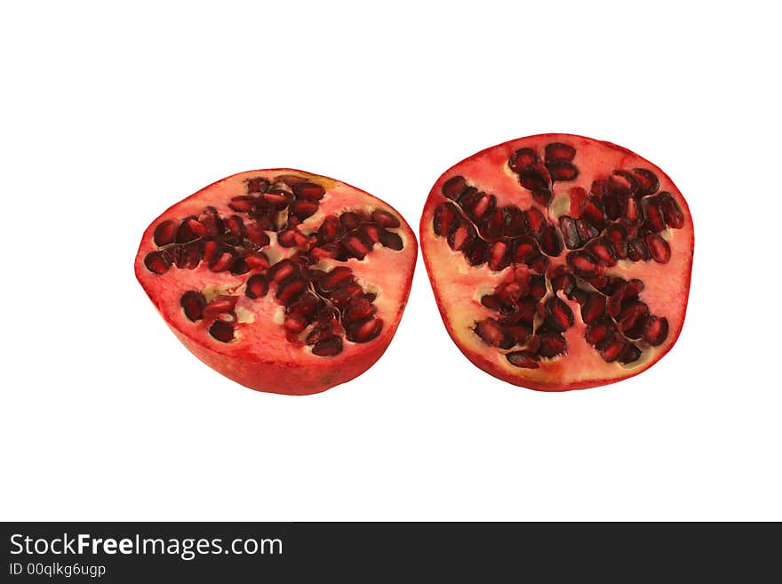 Isolated Pomegranate halves on white background