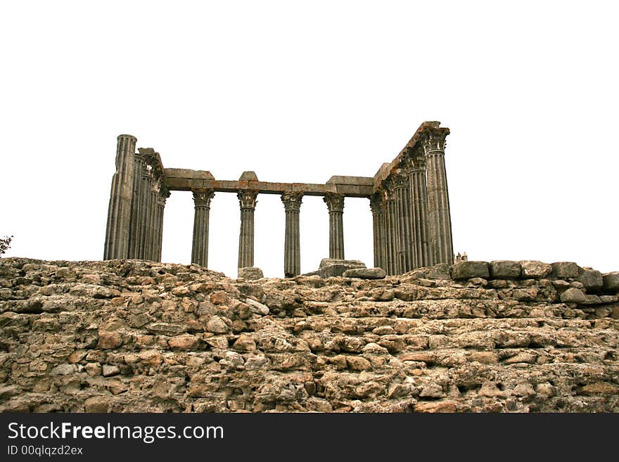 Ruins of roman temple in Evora, Portugal, isolated in white