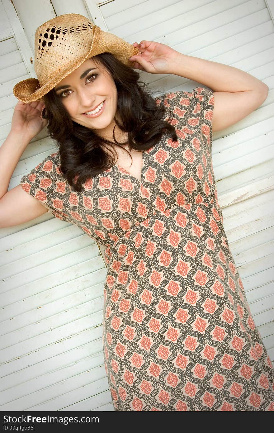 Beautiful woman wearing cowboy hat