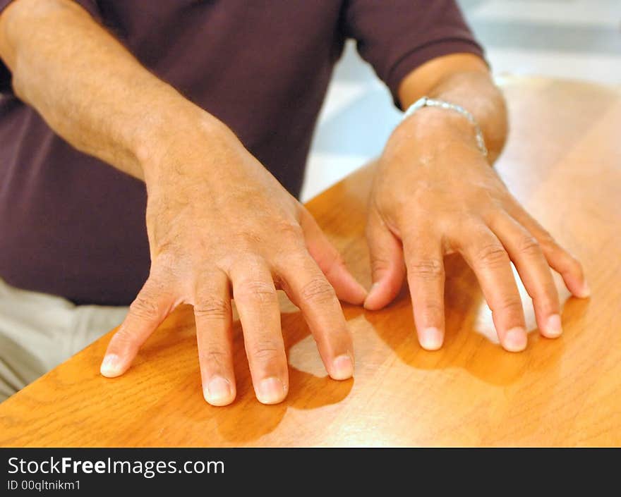 African american hands on the table.