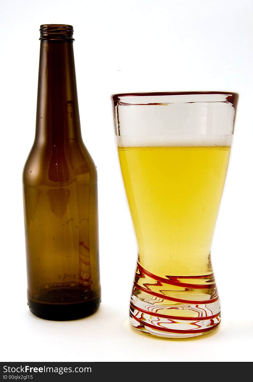 Glass of Beer and Beer Bottle Isolated on White Background. Glass of Beer and Beer Bottle Isolated on White Background.