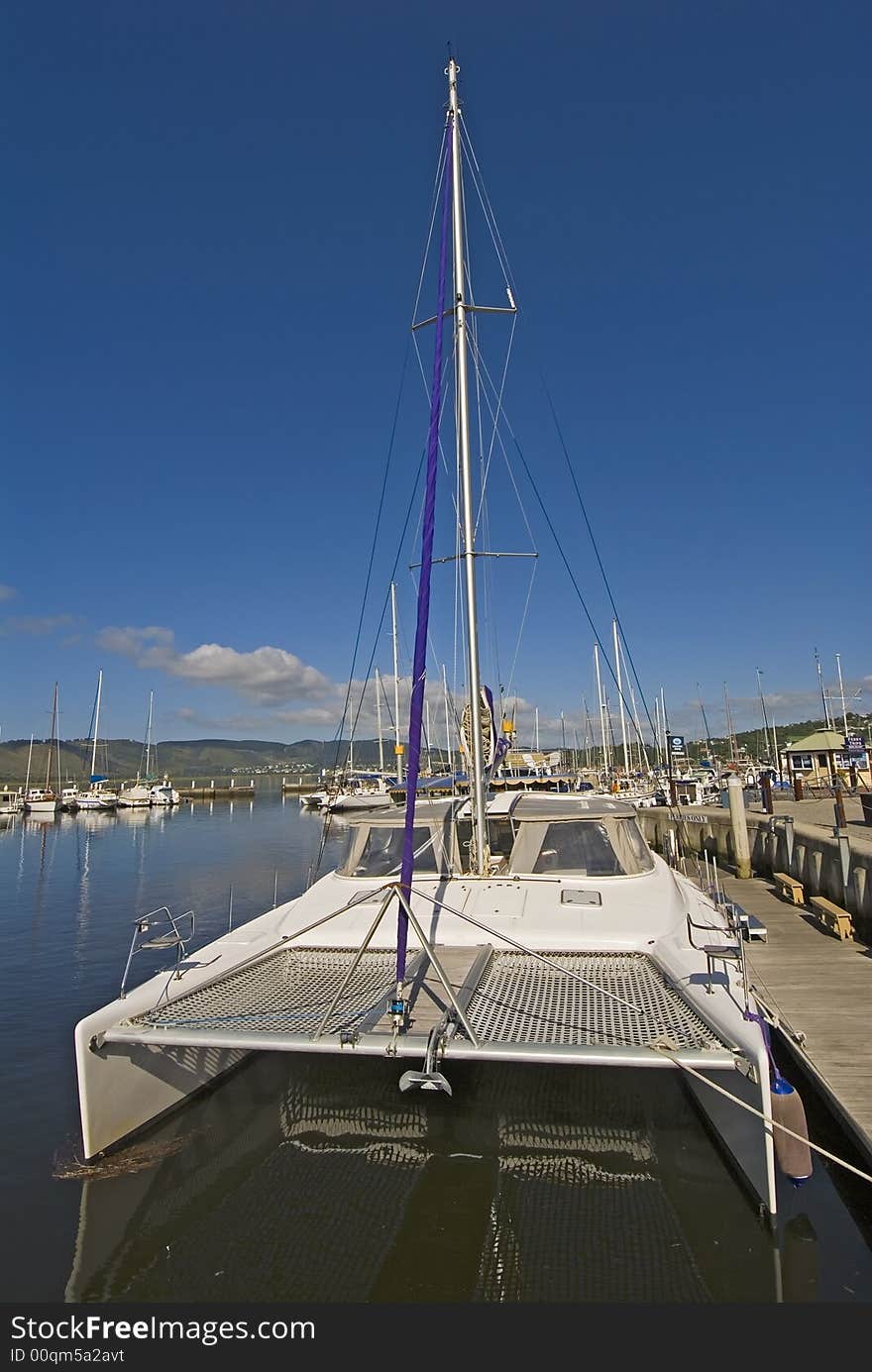 A twin Hull Yacht moored at the Knysna Yacht Club