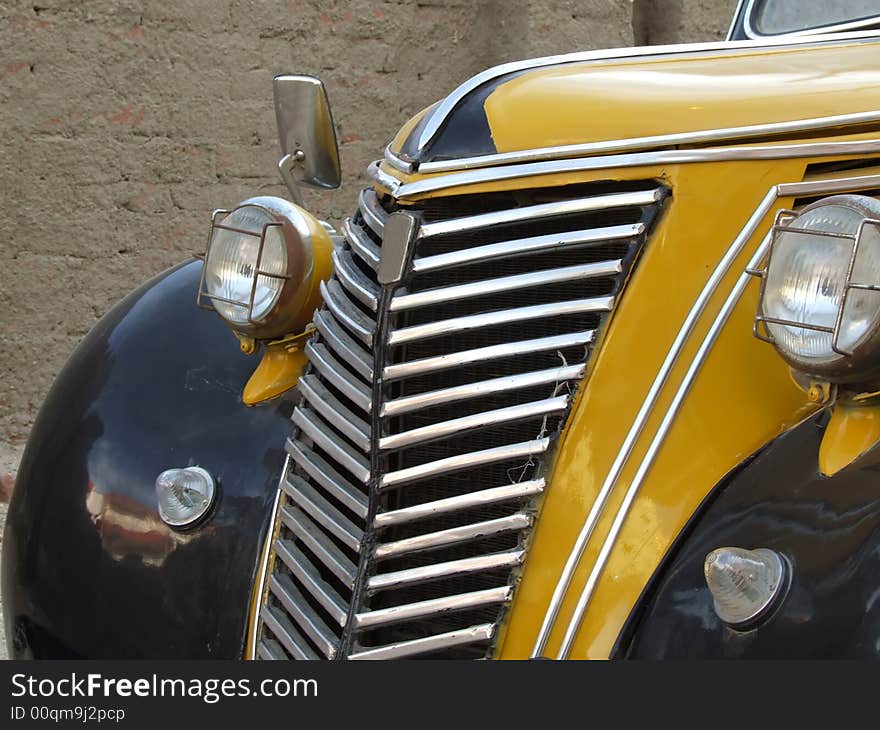 Radiator Of Old Yellow Car