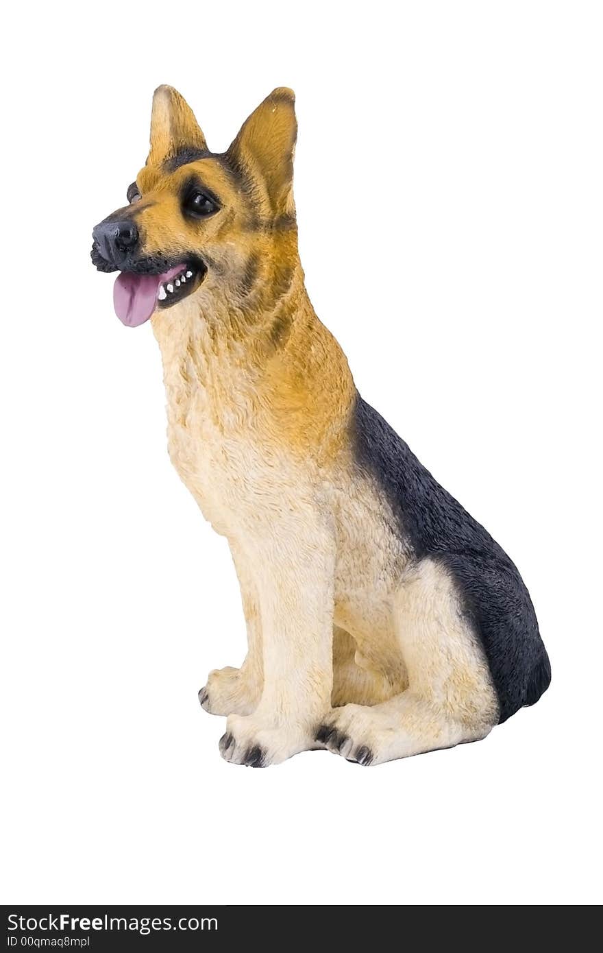 A small plastic toy doggie isolated on the white background