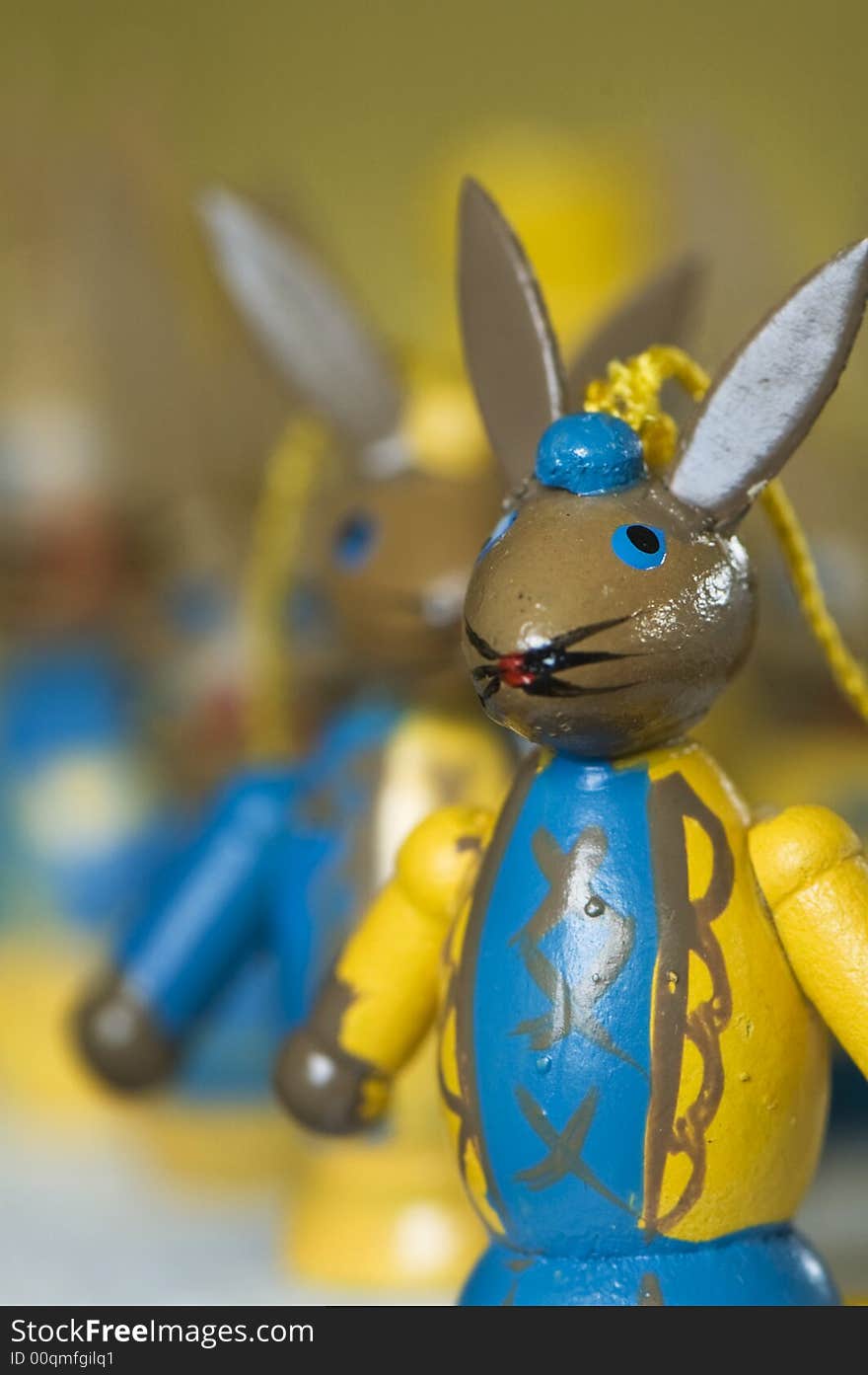 Colorful easter bunnies in yellow and blue