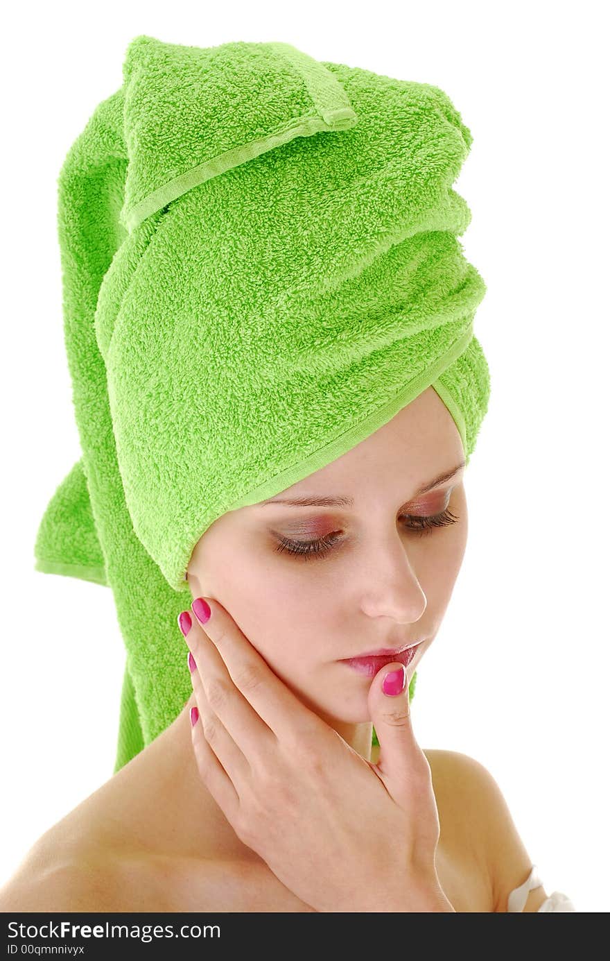 Young woman with green towel on her head. Young woman with green towel on her head