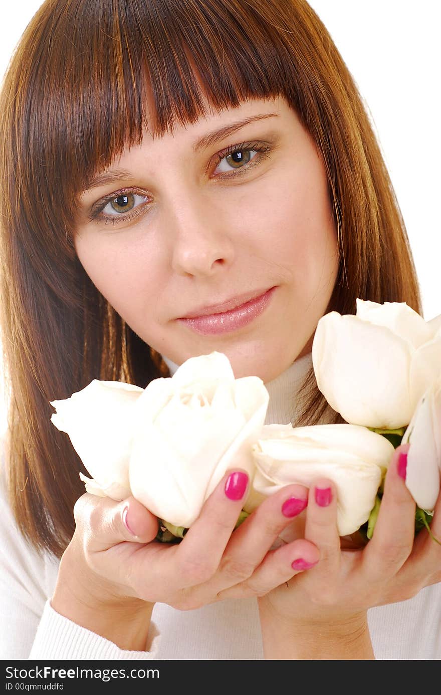 Pretty woman in white dress with white roses. Pretty woman in white dress with white roses